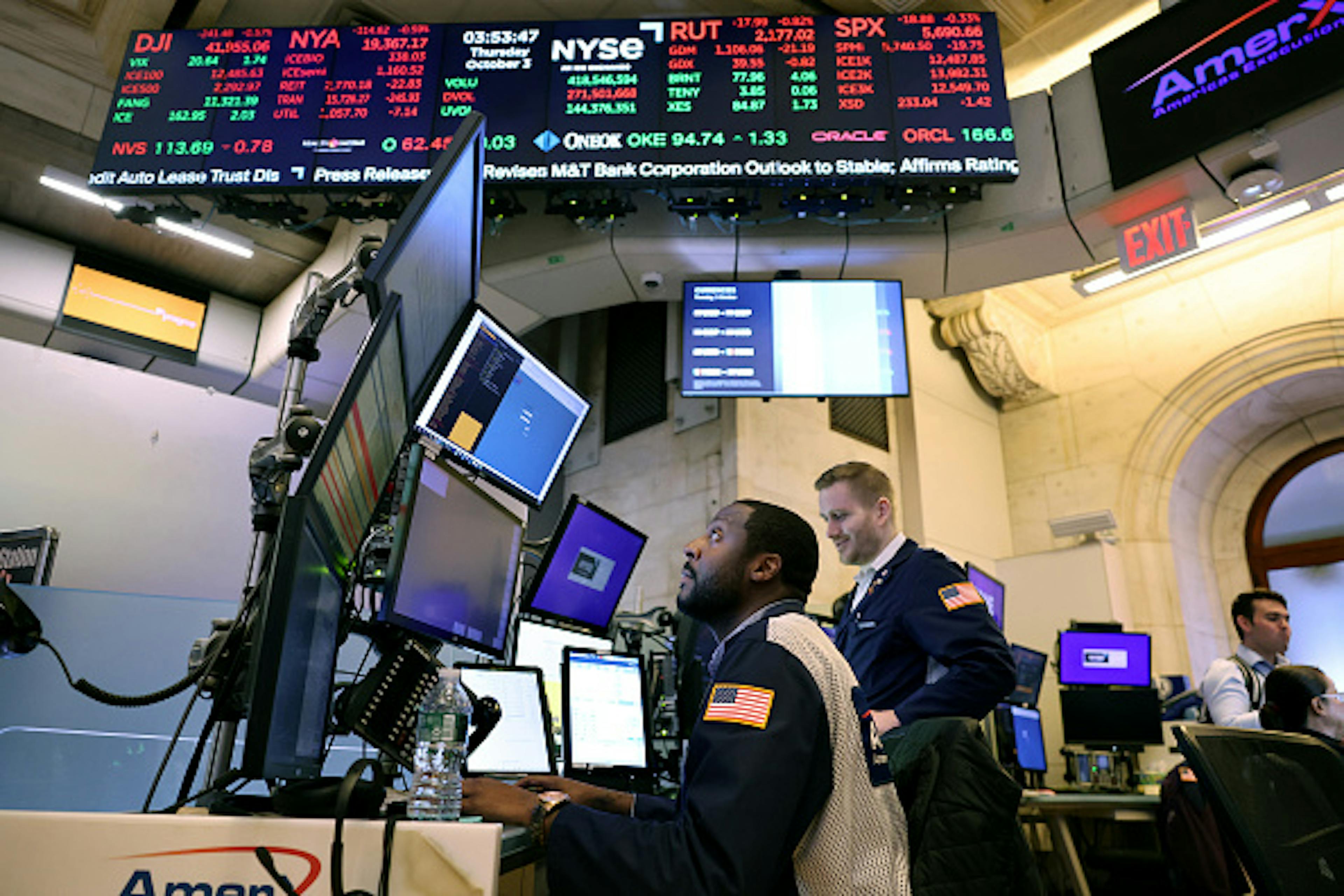 Eyes on earnings (Michael M. Santiago/Getty Images)