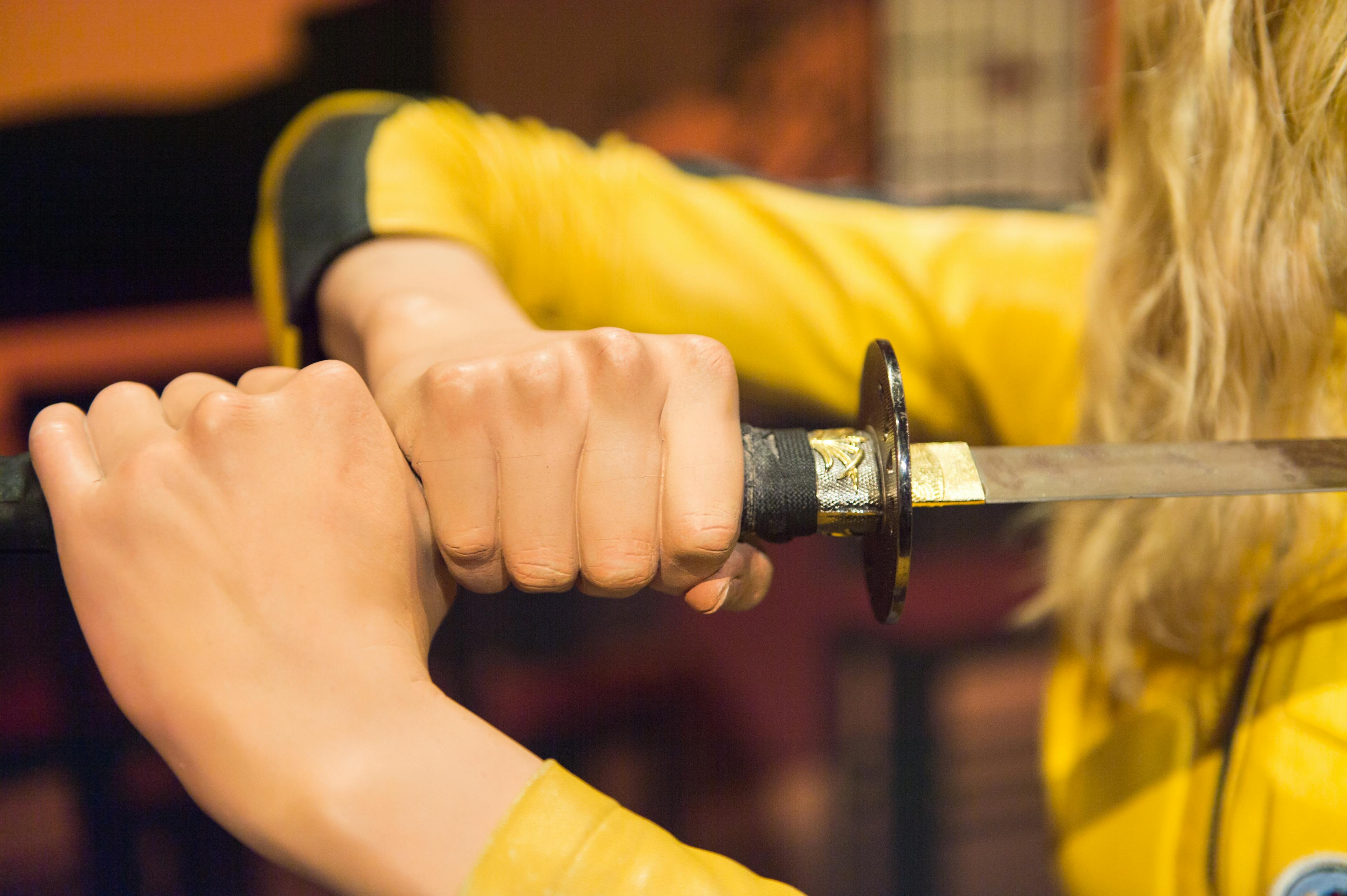 Kill bill character “the bride” holds her sword