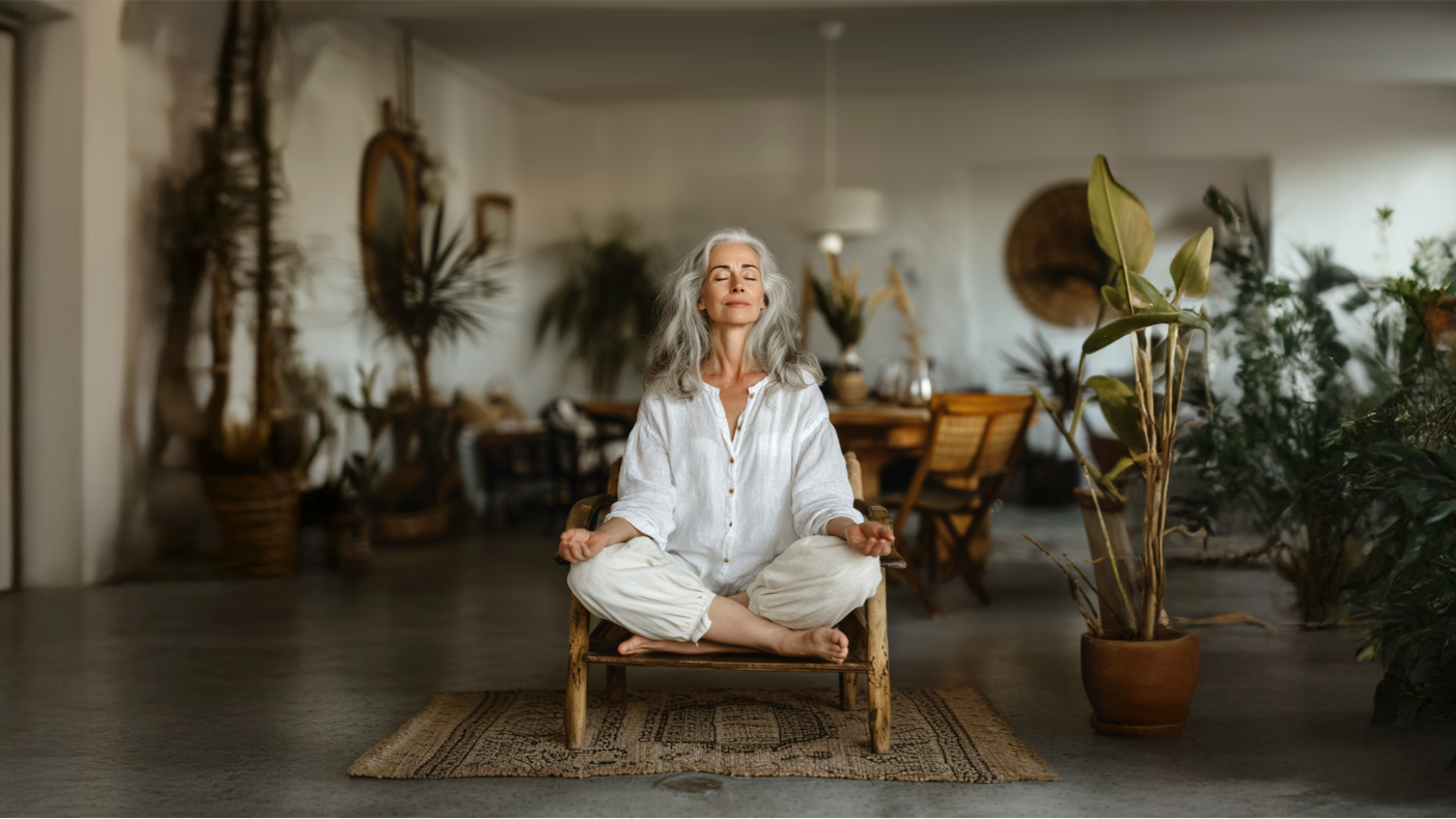 Woman in chair practicing yoga Simple